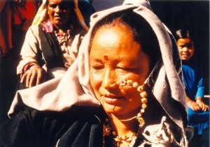 Women wearing Traditional nose pin in gold