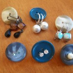 Buttons for organising earrings