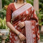 Wear bold earrings with saree and give neckpiece a miss