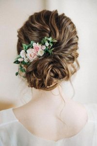 Bun hairstyle with flower arrangement
