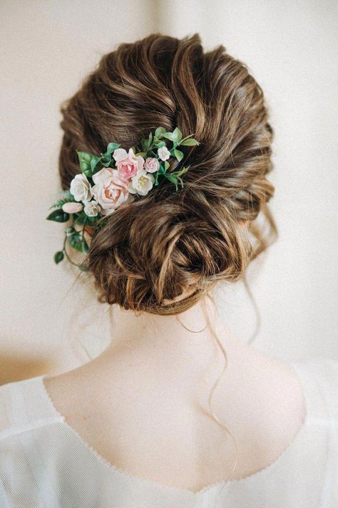 Bun hairstyle with flower arrangement