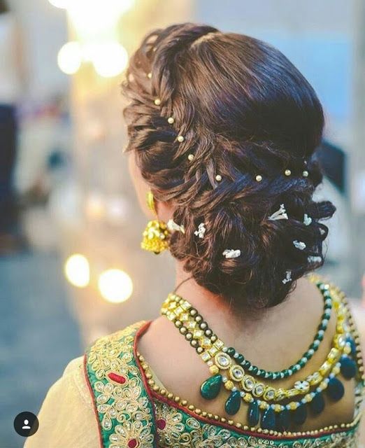 Bun hairstyle with fresh flower detailing | Threads - WeRIndia