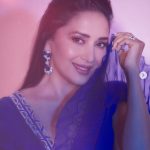 Madhuri Dixit looks surreal in a blue modern top and embroidered skirt